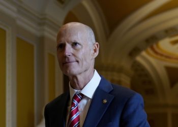 RICK SCOTT